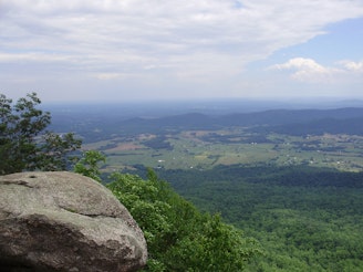 2017-06-21_15_00_37_View_southeast_from_about_2,680_feet_above_sea_level_along_the_Ridge_Trail_on_the_northeast_side_of_Old_Rag_Mountain_within_Shenandoah_National_Park,_in_Madison.jpg